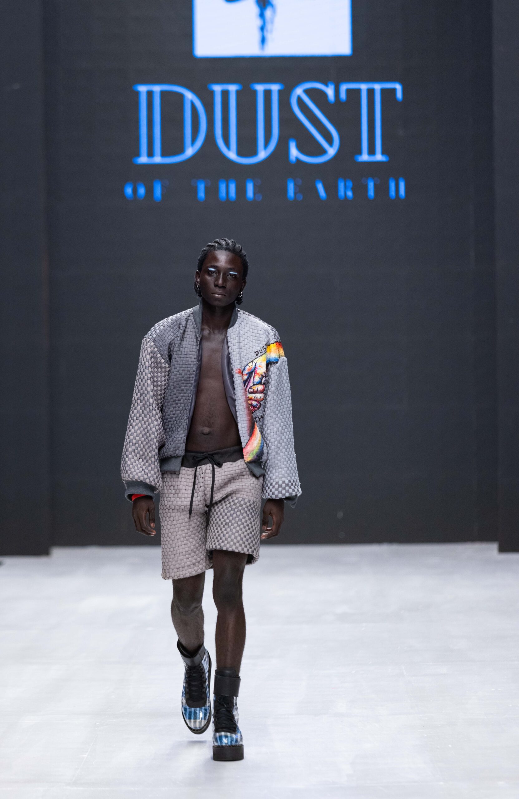Models on Lagos Fashion Week 2024 runway, showcasing Nigerian designs with African textiles and vibrant street style.