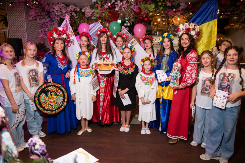 Founder Natalia Syvak addressing guests at MOM plus ME Foundation's 17th anniversary in Vienna