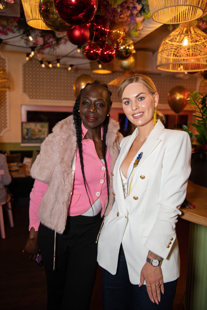 Guests engaging at the MOM plus ME charity event in Vienna