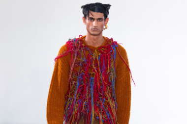 Qasimi AW25 design featuring indigenous embroidery and bold colors
