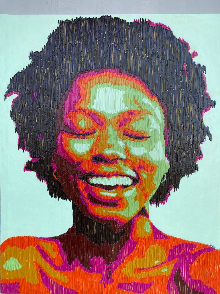 A vibrant embroidered portrait by Adedoyin Bello-Adelani showcasing feminist themes