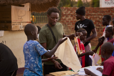 Godfrey Katende at a fashion workshop empowering young Ugandan designers