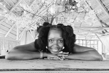 Sawe Catherine smiling in her fashion studio