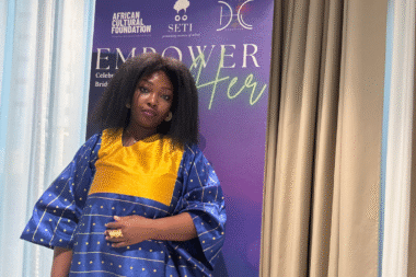 Audrey Kodjo smiling at Diaspora Creatives event showcasing African designers in Europe – diaspora innovation