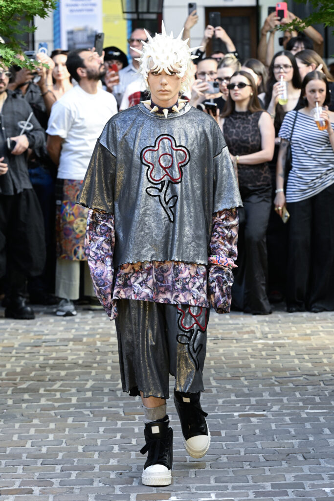 Model wearing KIDILL SS26 collection “SPIRITUAL BLOOM” inspired by Japanese subcultures and futuristic punk fashion