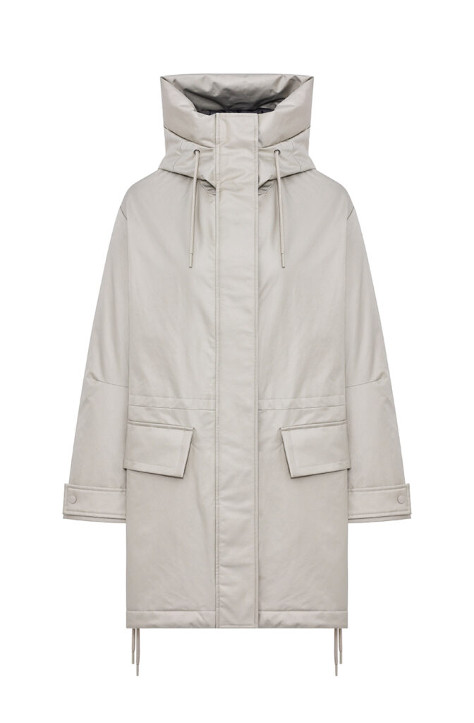 Model wearing a wool vest and lightweight coat from the DUNO SS25 outerwear collection