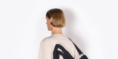 Close-up of Ucon Acrobatics Moss Series backpack showing padded texture and minimalist waterproof design.