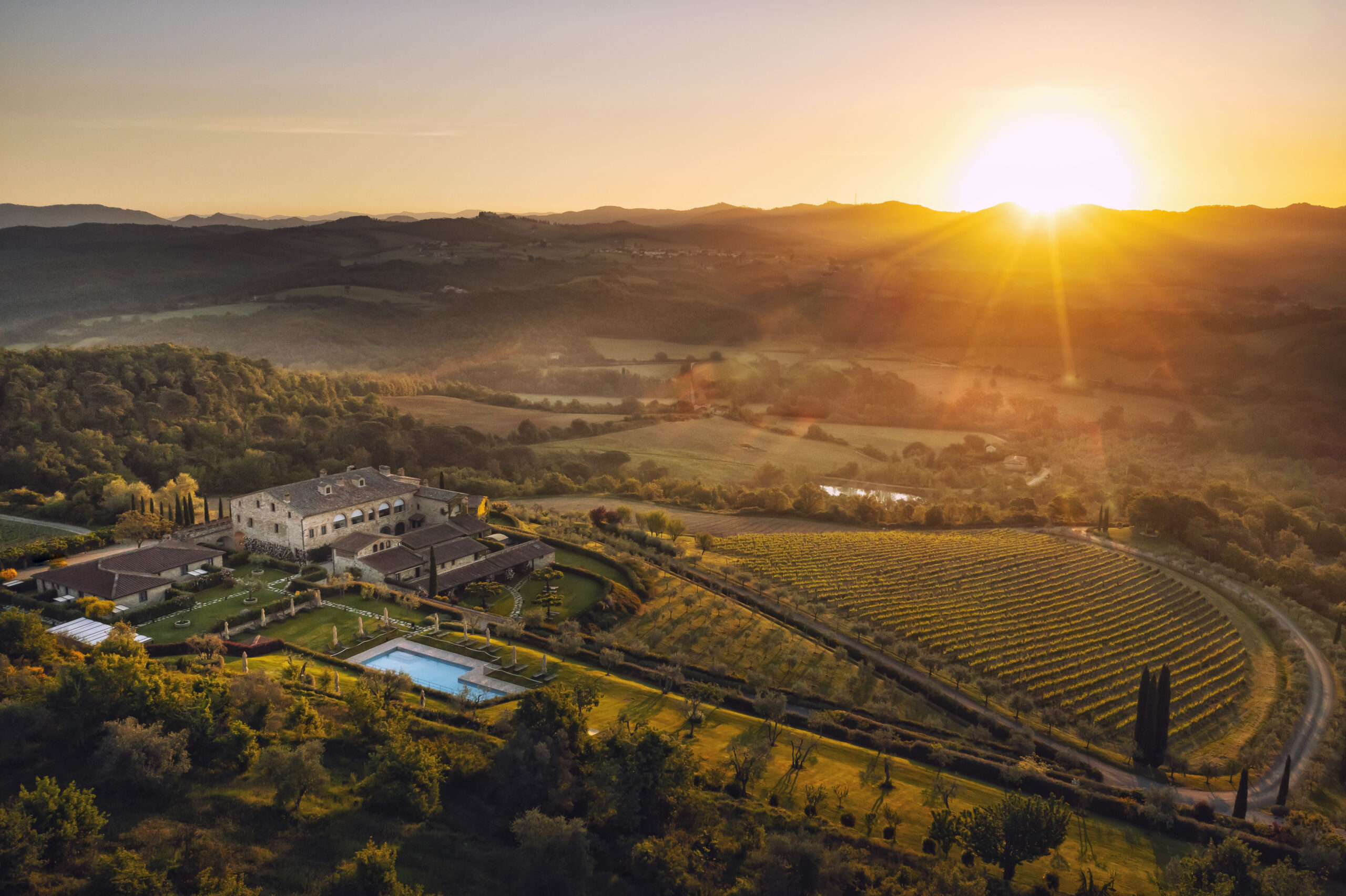 La Colonna restaurant at Hotel Le Fontanelle with panoramic views of the Tuscan hills in Chianti.