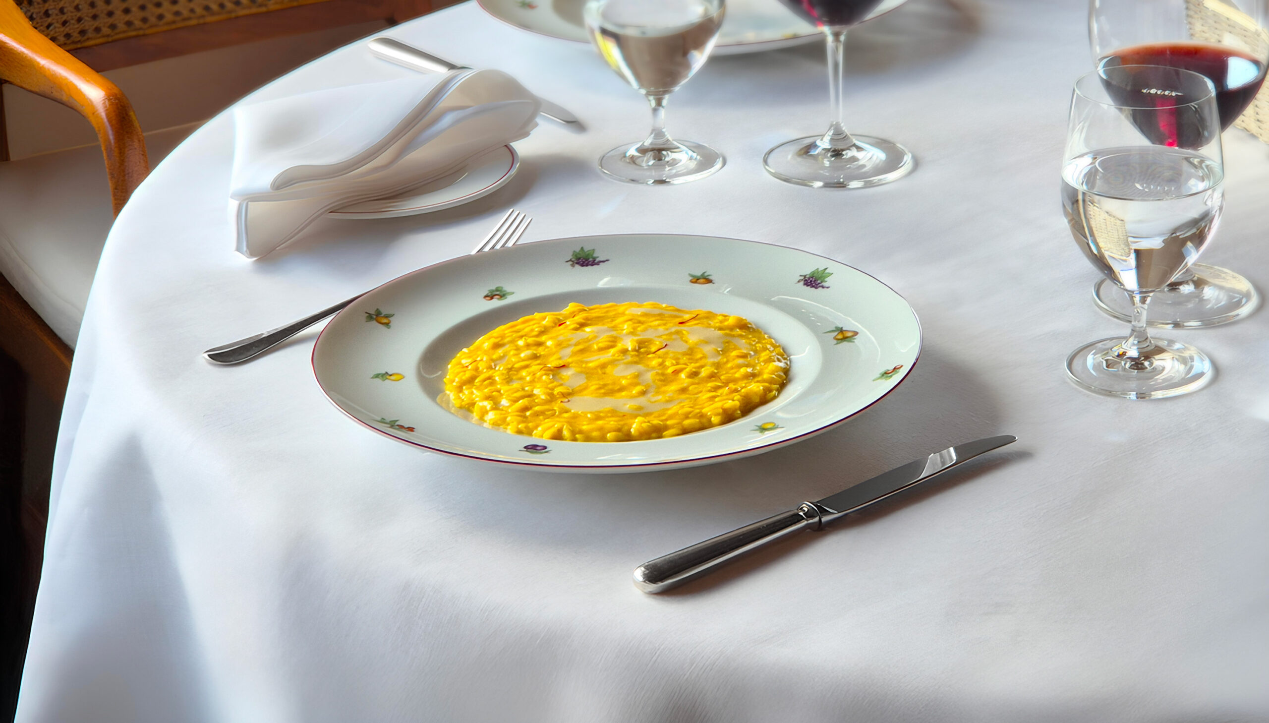 La Colonna restaurant at Hotel Le Fontanelle with panoramic views of the Tuscan hills in Chianti.