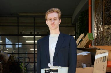Model wearing Simon Cracker SS2026 Collection in upcycled, deconstructed fashion with neutral tones and signature detailing.