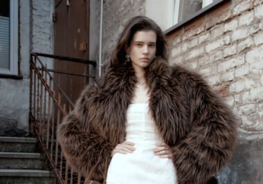 Model in Magda Butrym Pre-Spring 2026 collection wearing sculptural silhouette with lace and leather