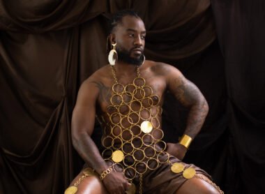 Kenyan jewellery designer Gandani Carlton styling a brass necklace