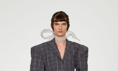 Model wearing Rave Rvw SS26 Blommornas Makt floral-inspired structured suiting at Copenhagen Fashion Week runway show.