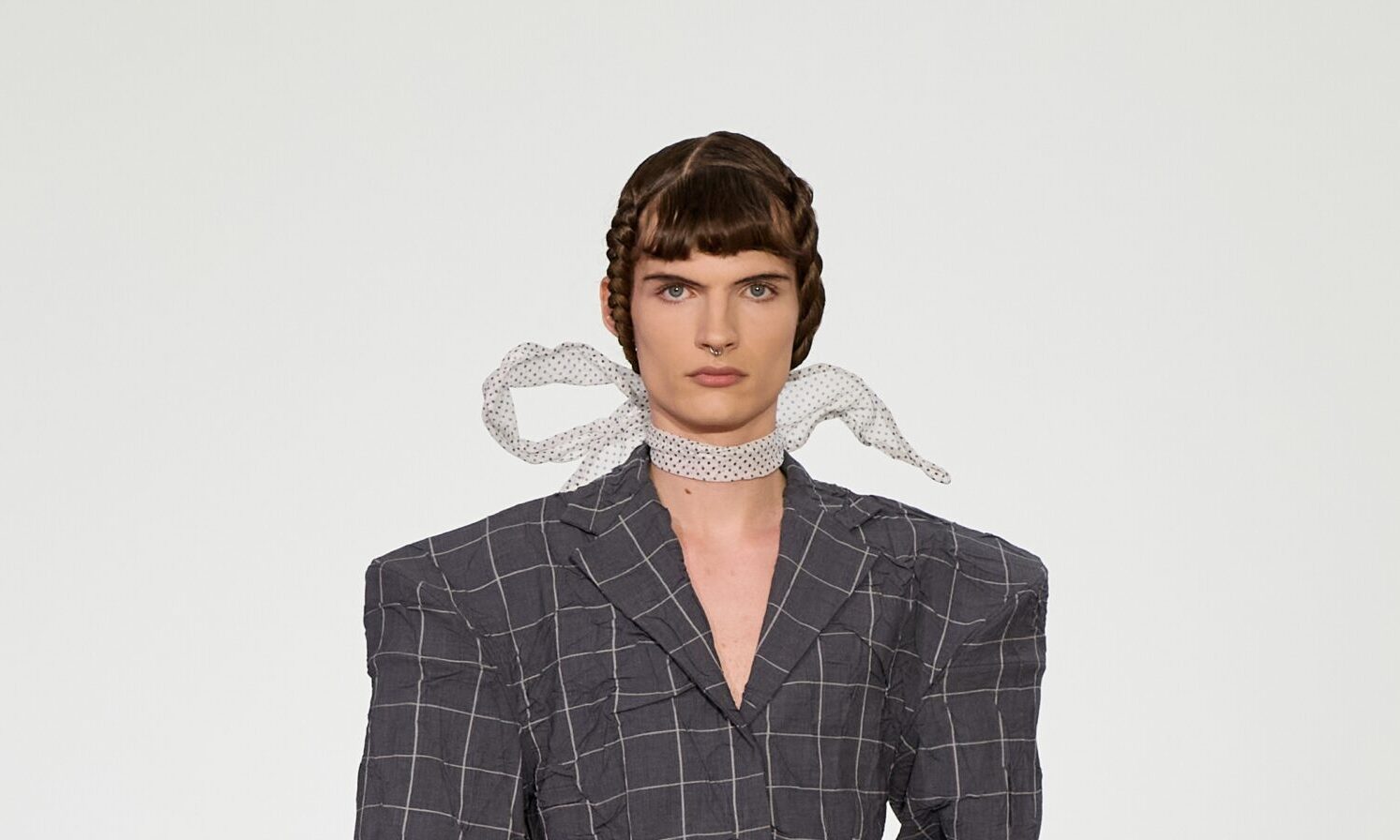 Model wearing Rave Rvw SS26 Blommornas Makt floral-inspired structured suiting at Copenhagen Fashion Week runway show.