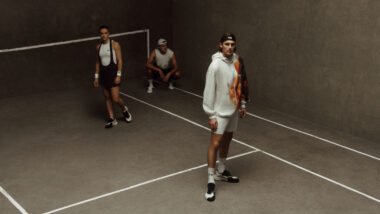 Athletes wearing Y-3 Fall/Winter 2025 Tennis collection with avant-garde performance apparel and footwear.