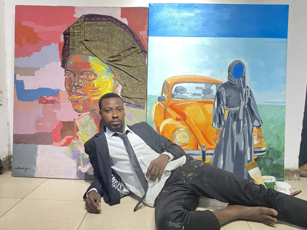 Ife Olowu in his Lagos studio surrounded by paintings and digital works