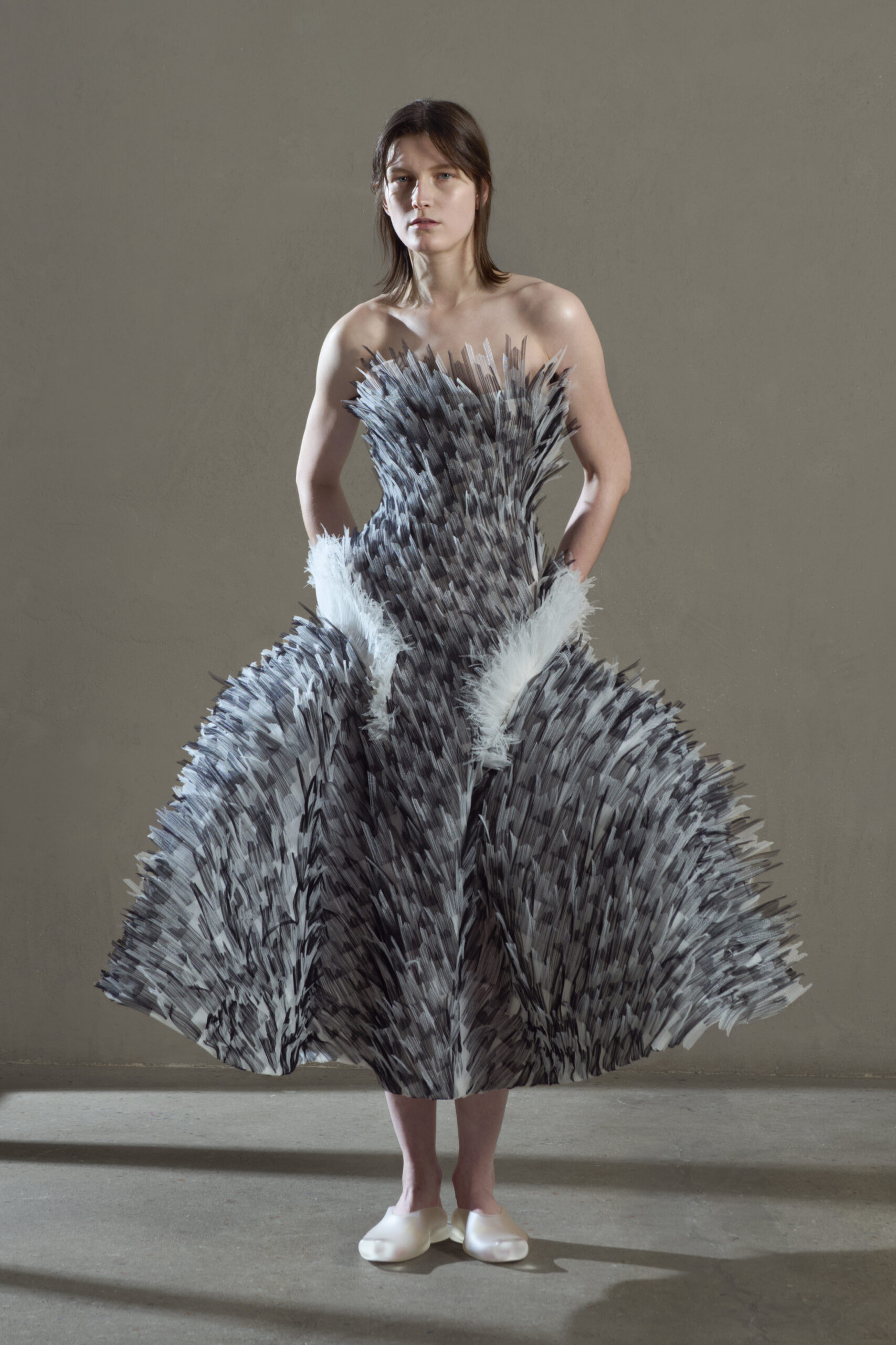 LÙCHEN sustainable couture collection exploring material movement and reclaimed feathers