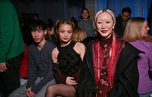 Model wearing spiked merino knit from Chet Lo Fall Winter 2026 Night Market runway show in London