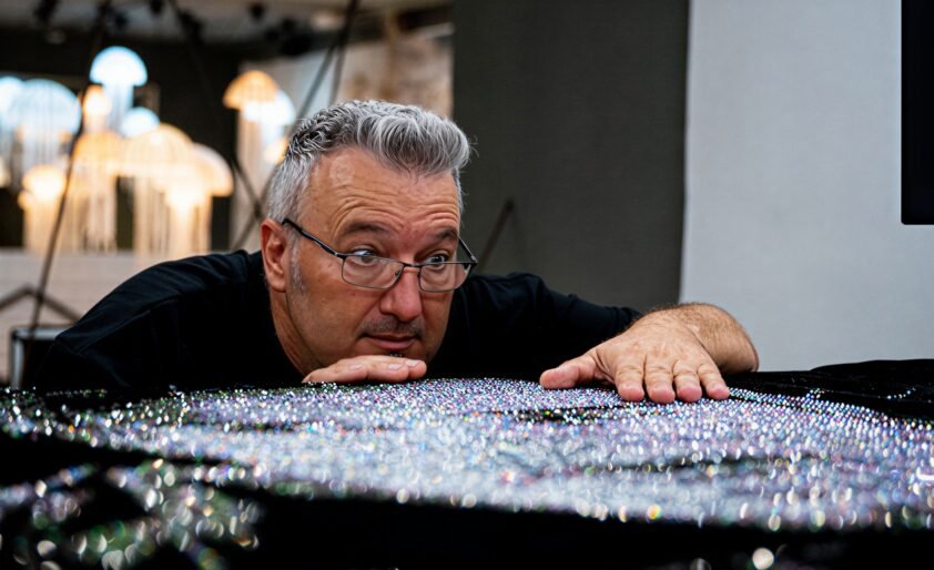 Yago Sánchez crystal mosaic portrait artwork showing depth and light from a distance