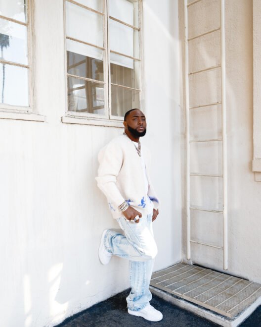 Davido showcasing his signature style and cultural identity