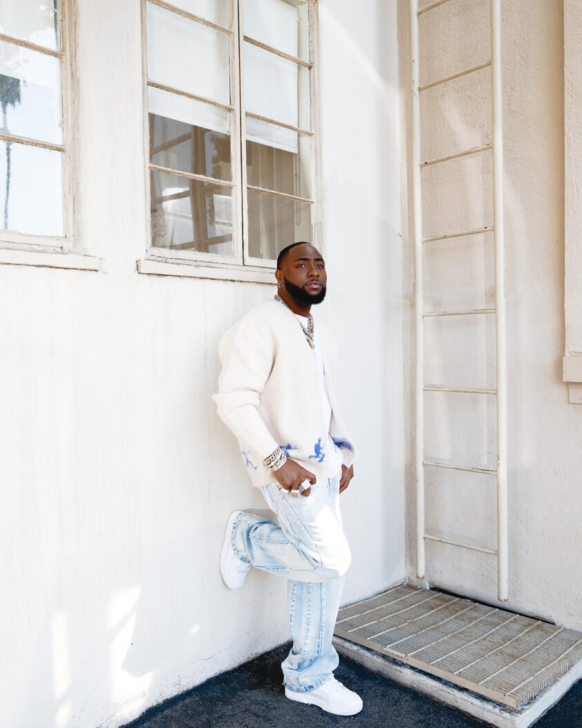 Davido showcasing his signature style and cultural identity