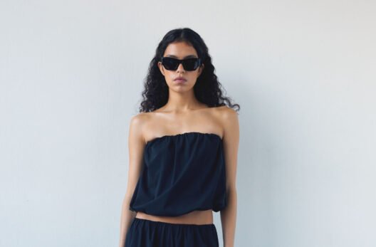 Oval Square Pre Fall 2026 editorial — tube tops boleros and denim capris reshaped through precise cuts and elevated fabrications