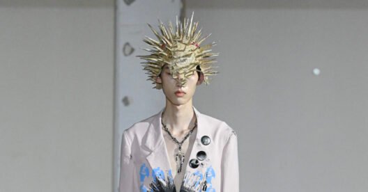 KIDILL Spring Summer 2027 Chaotic Discord collection runway look by designer Hiroaki Sueyasu