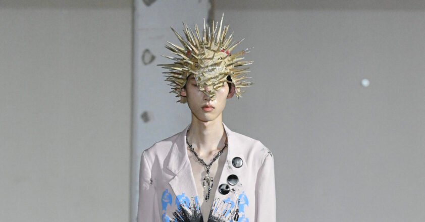 KIDILL Spring Summer 2027 Chaotic Discord collection runway look by designer Hiroaki Sueyasu