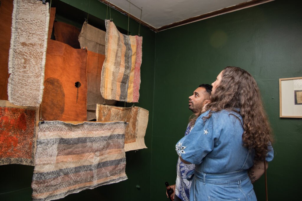 Kajebe Jacob artwork displayed in a contemporary African art exhibition