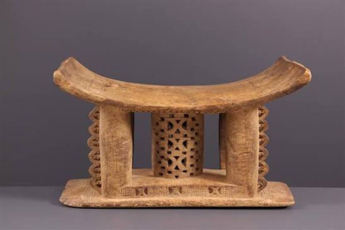 Design classic — Asante stool carved from a single block of wood representing the soul of its owner in Akan culture with no credited maker